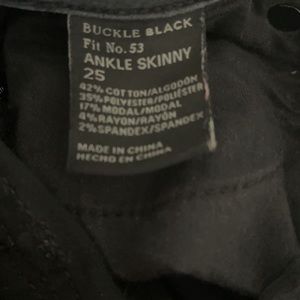Black skinny jeans-Buckle